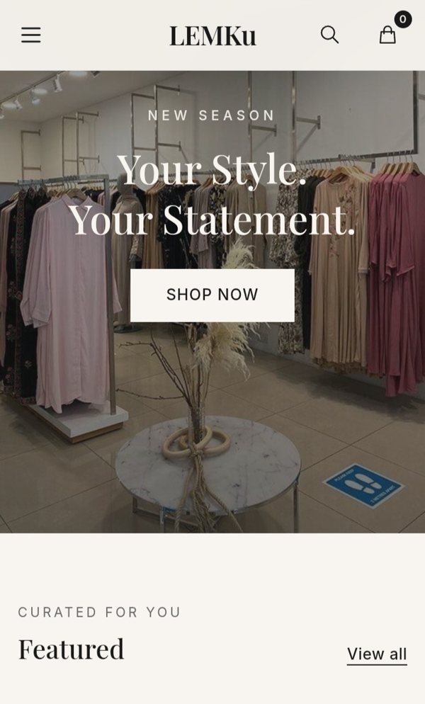 Phone view of the LEMKu online store with a hero banner reading Your Style. Your Statement., a Shop Now button and a Featured collection below